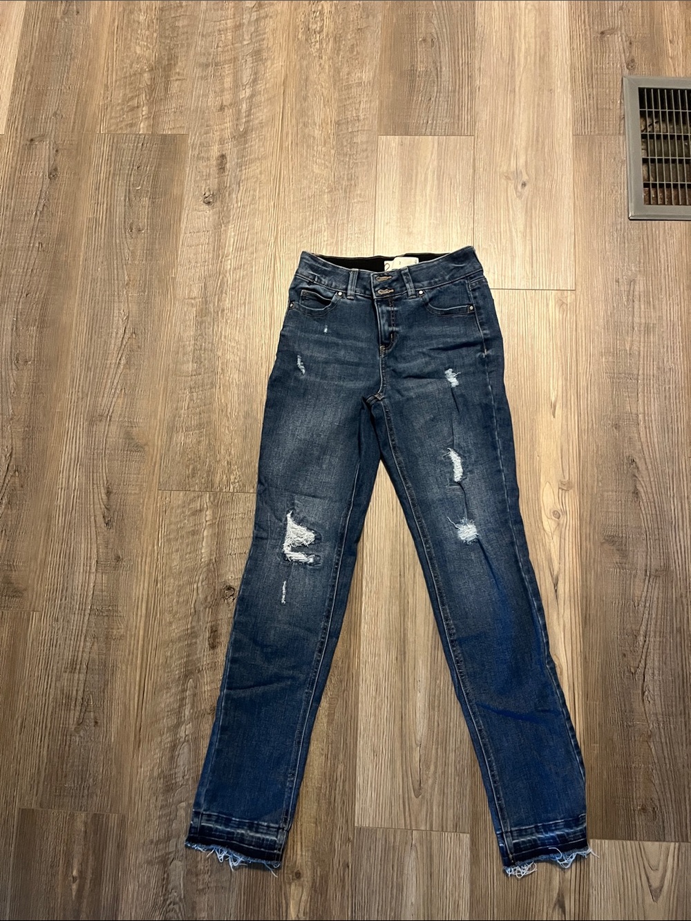 Women’s Distressed Dark Blue Jeans